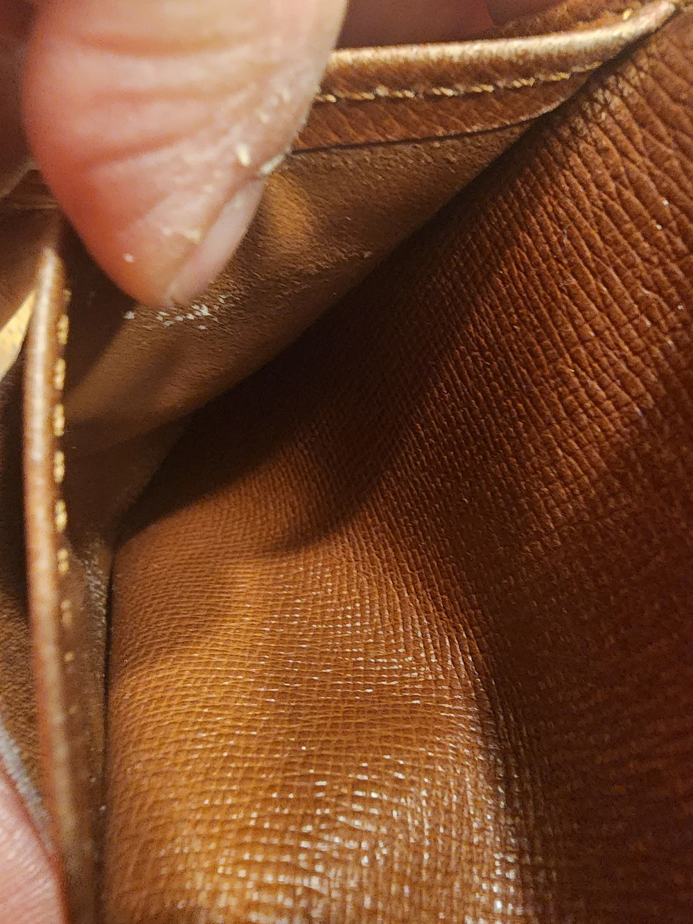 vintage Louis Vuitton Monogram Elise Wallet crafted in the classic brown LV